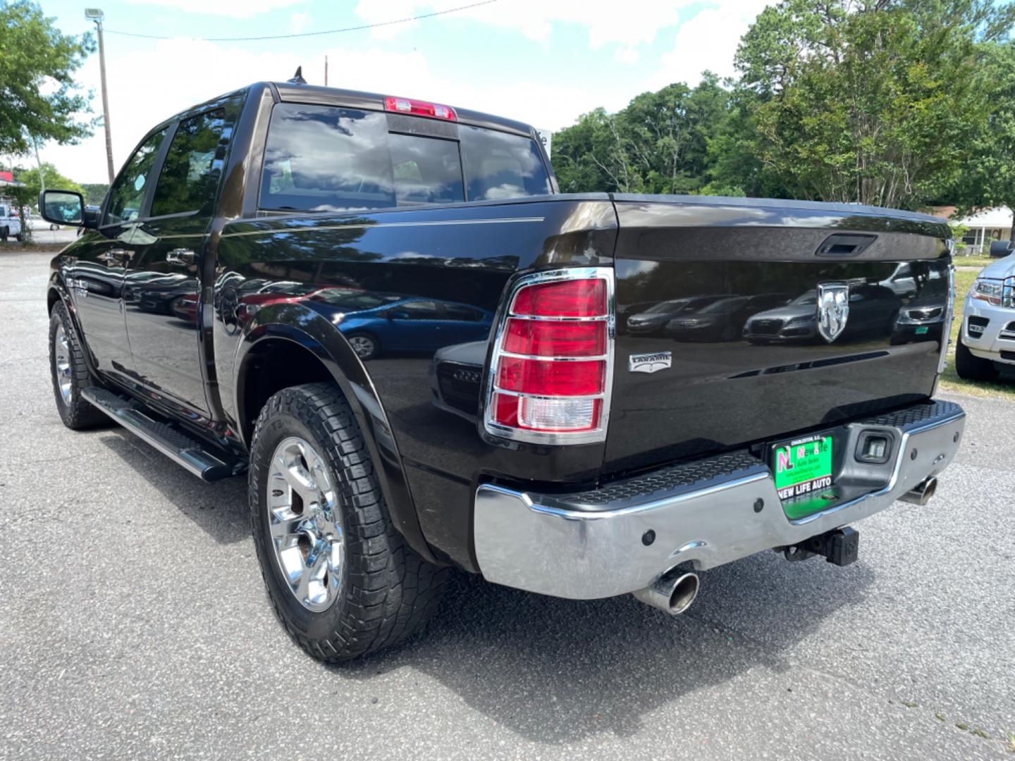 2013 BROWN RAM 1500 LARAMIE (1C6RR6NT8DS) with an 5.7L engine, Automatic transmission, located at 5103 Dorchester Rd., Charleston, SC, 29418-5607, (843) 767-1122, 36.245171, -115.228050 - Clean CarFax (no accidents reported!) Leather, Navigation, Backup Camera, CD/Sat/Bluetooth, Dual Climate Control, Power Everything (windows, locks, seats, mirrors), Heated/Cooled Seats, Heated Rear Seats, Heated Steering Wheel, Power Sliding Rear Window, Power Inverter, Push Button Start, Keyless E - Photo#4